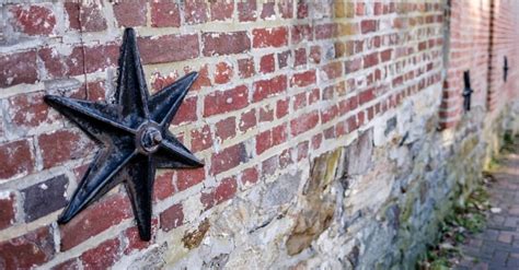 metal star outside of house|metal stars on old house.